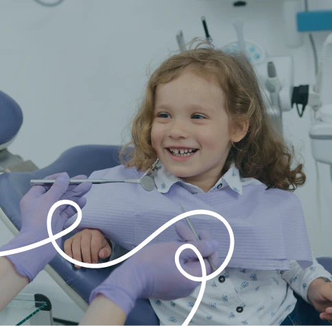 Mobile_About_Us_Making_Care Pediatric dental team helping children feel comfortable in Franklin, Wisconsin
